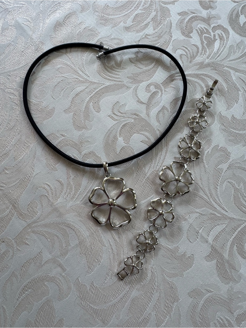 Lia Sophia Silver Floral Pendant Necklace and Matching Bracelet Set - Picture 2 of 2